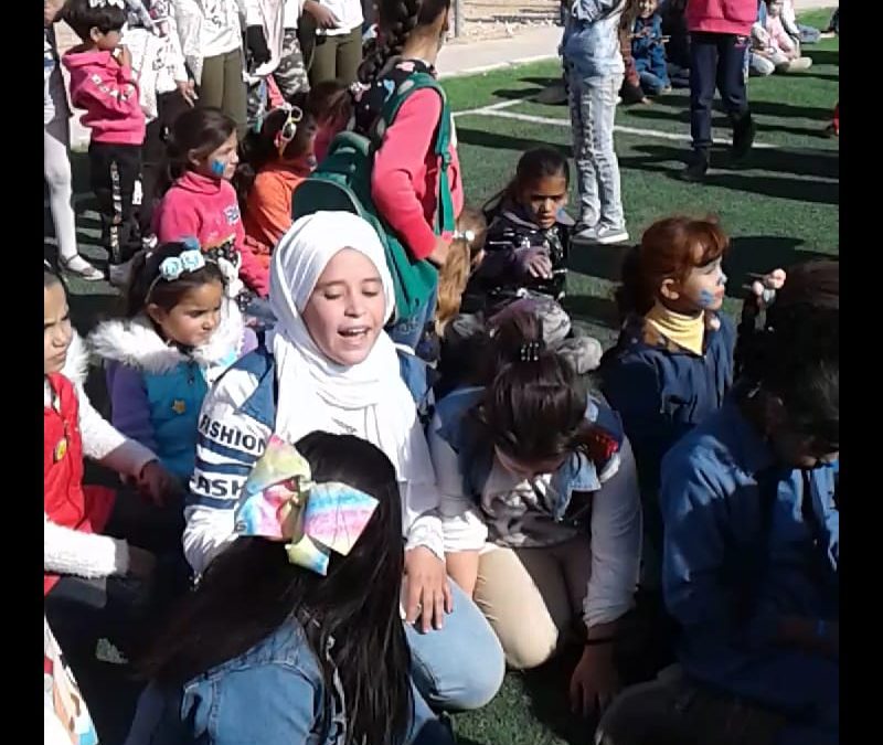 Amnah Aleid with UNICEF kids